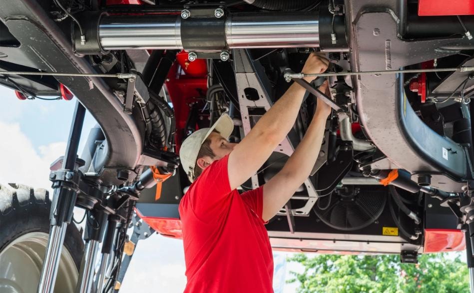 Mechanic working under a vehicle